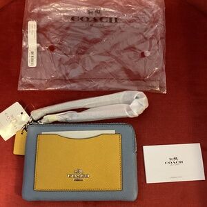 NWT Coach light blue and cornflower Wristlet